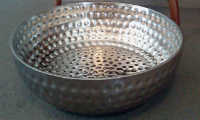 Large metal bowl for soaking feet.